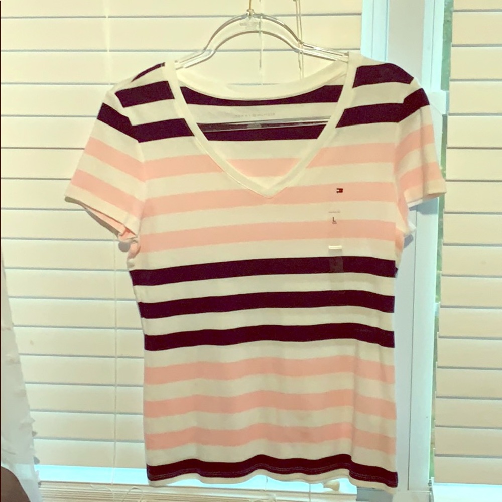 Pink, white, and navy blue V-neck top.
